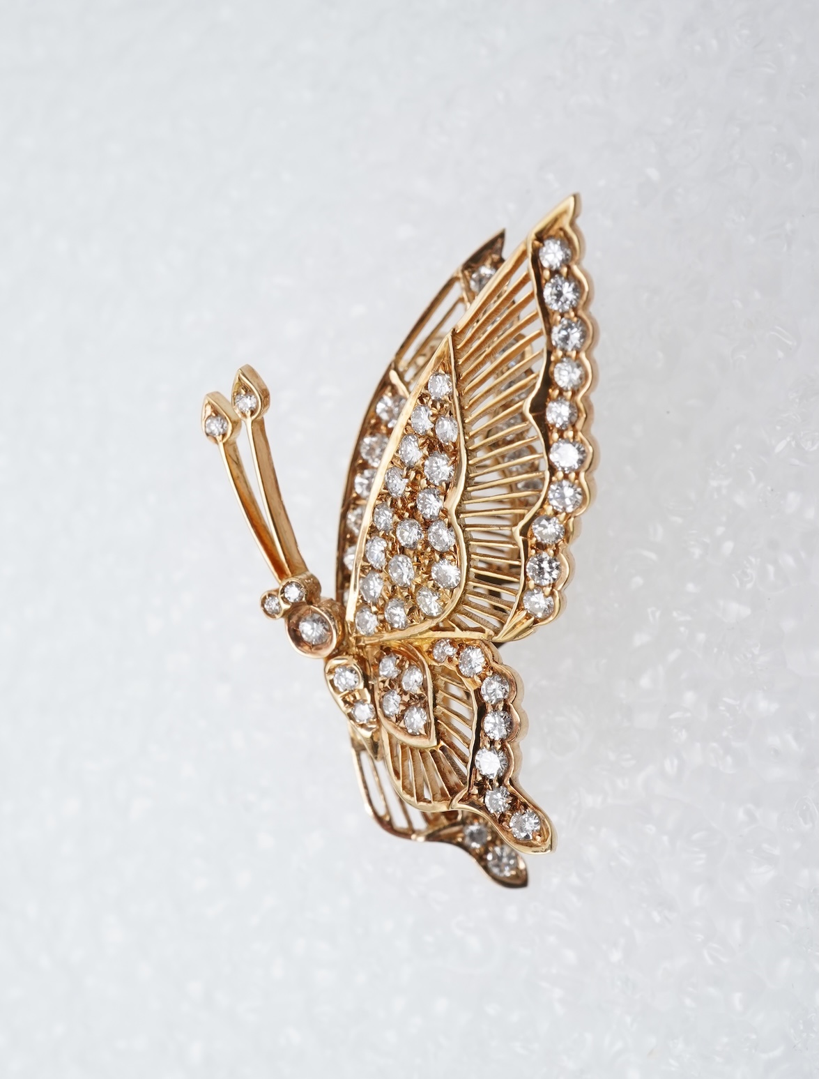 A diamond butterfly brooch